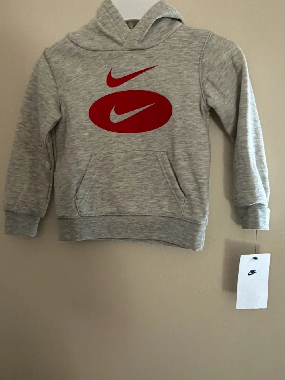 Nike Kids Gray Pullover Hoodie with Red Swoosh Graphic